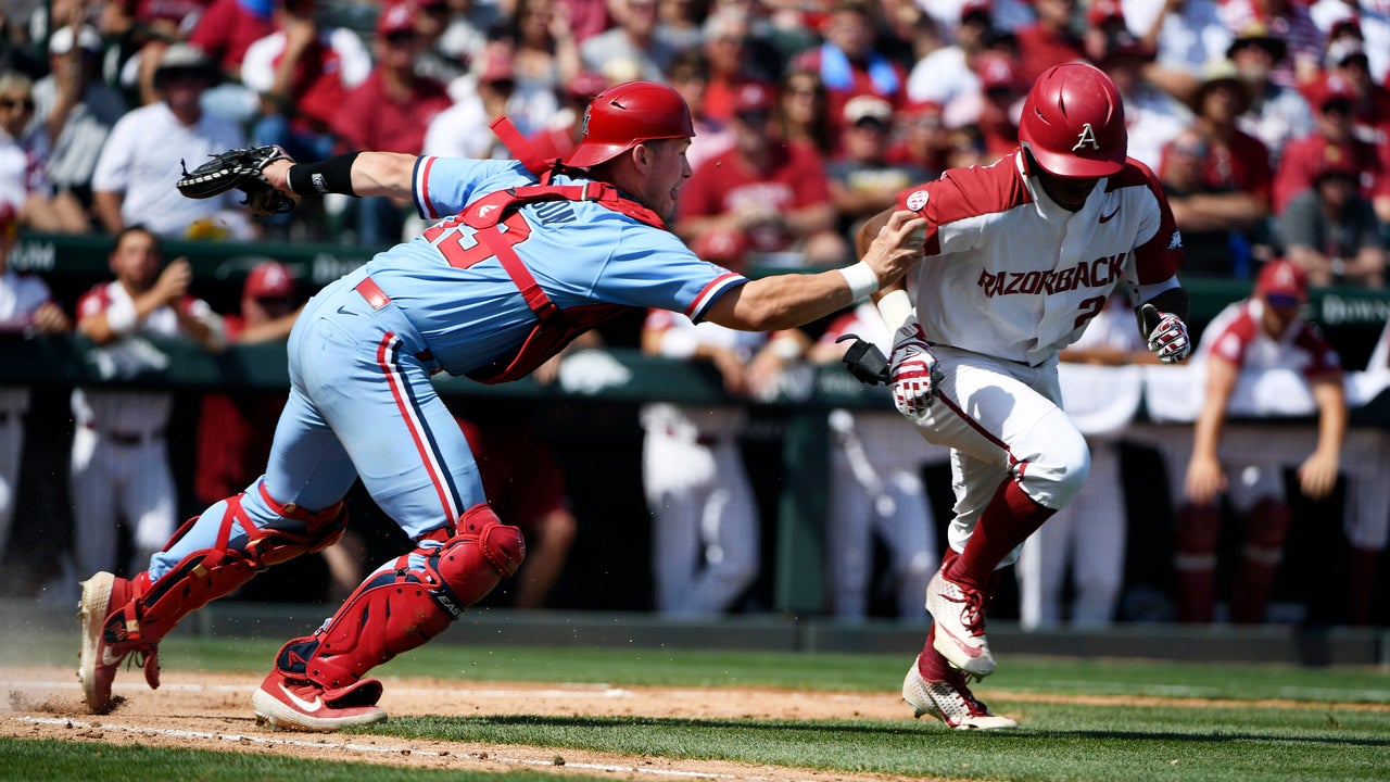 Arkansas pounds Ole Miss 14-1, earns return to CWS